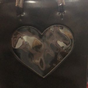 Black book bag with clear heart front pocket